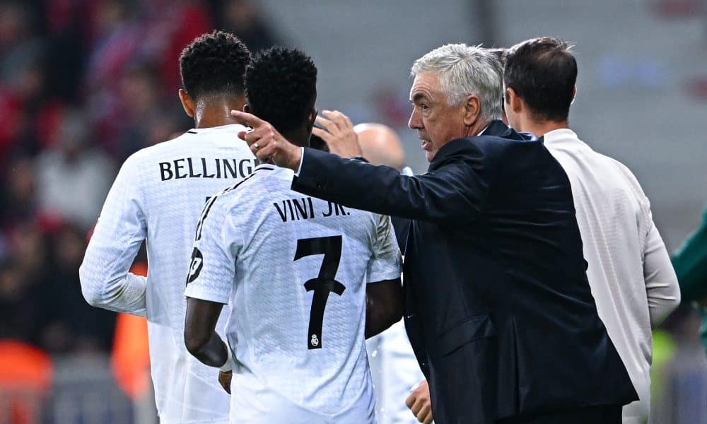 L'entraîneur du Real Madrid, Carlo Ancelotti, et Vinicius Jr.