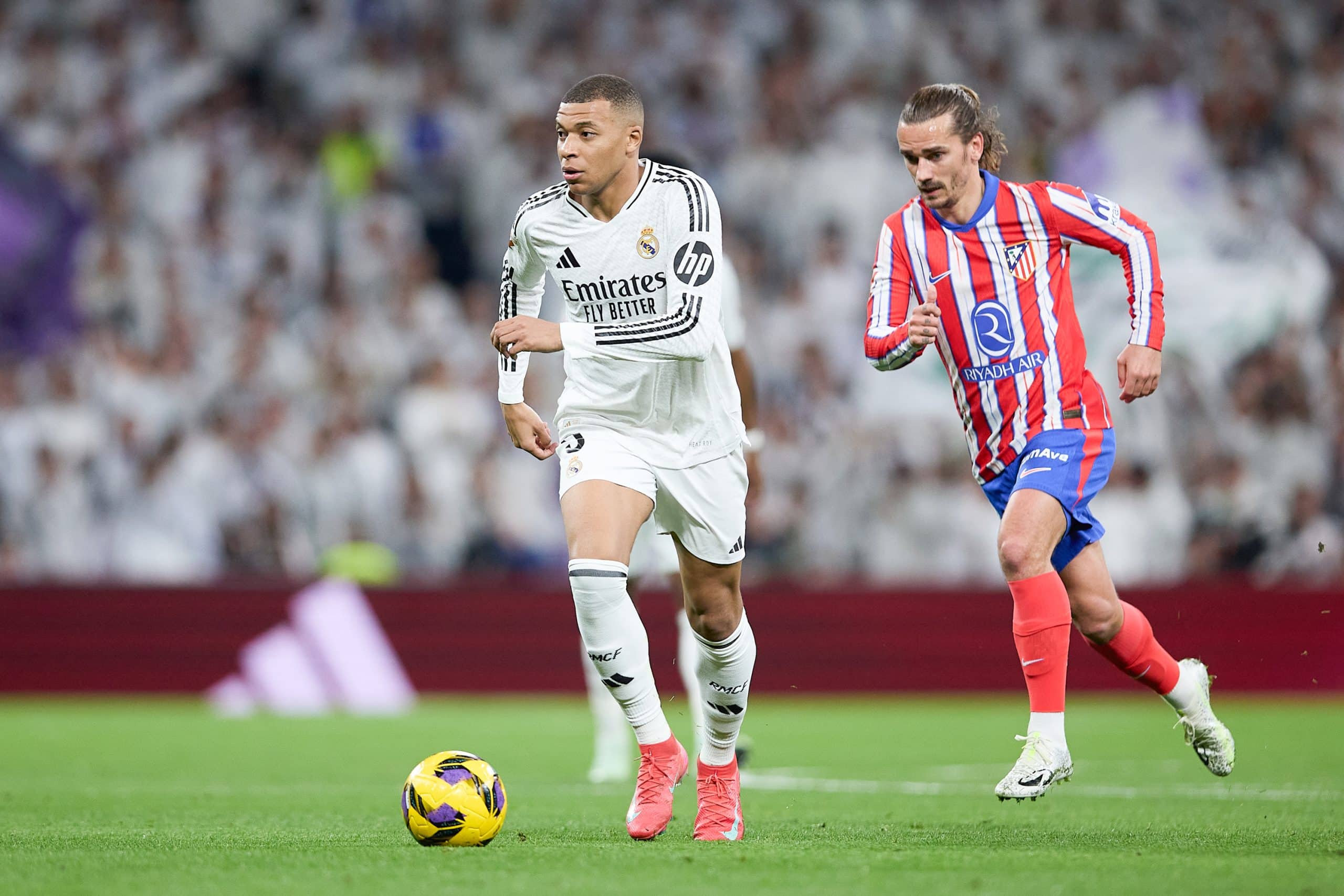 L'attaquant du Real Madrid Kylian Mbappé et son compatriote Antoine Griezmann (Atlético).