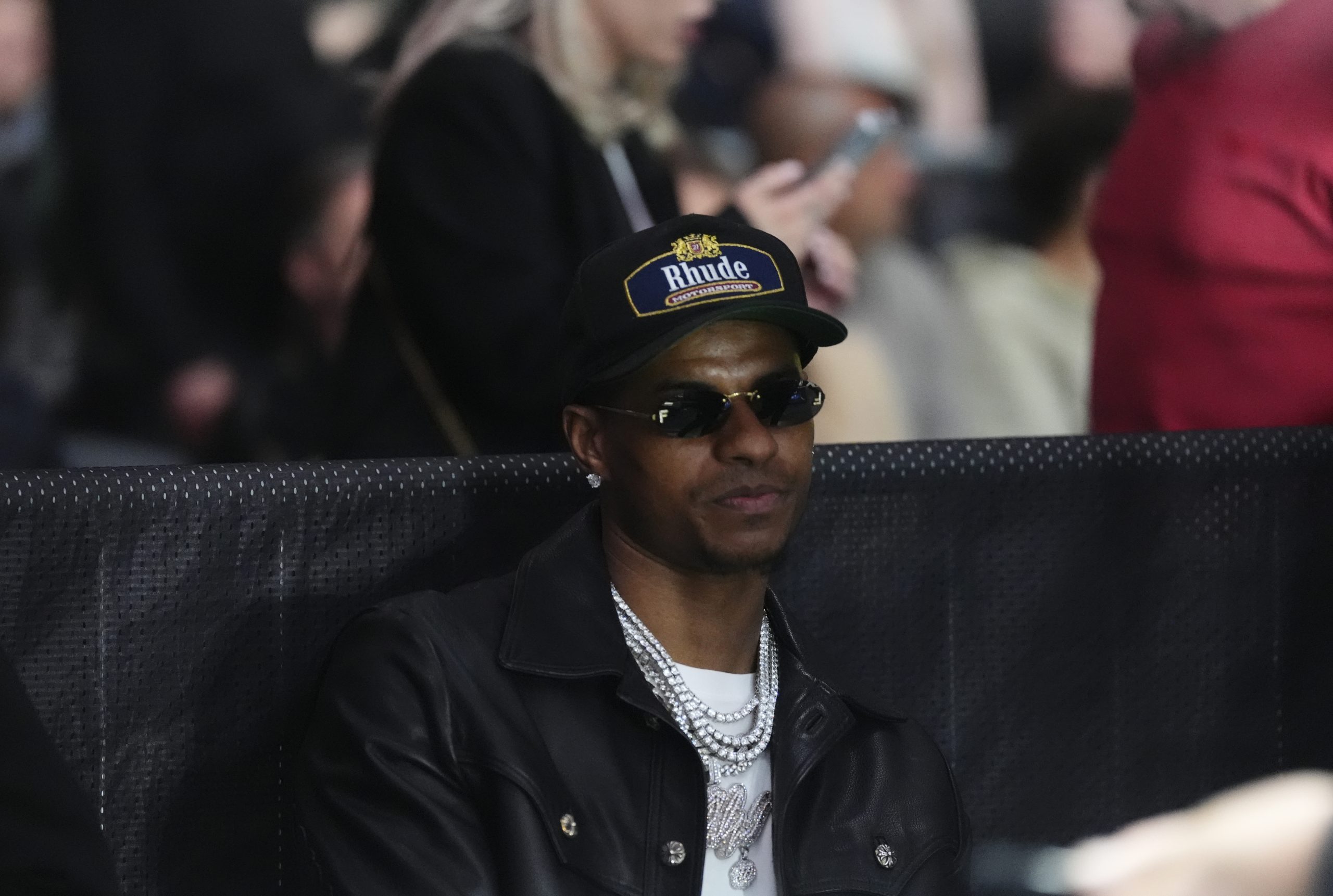 Marcus Rashford assitant à un combat de boxe.