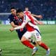 Achraf Hakimi du PSG face à Martinelli d'Arsenal.