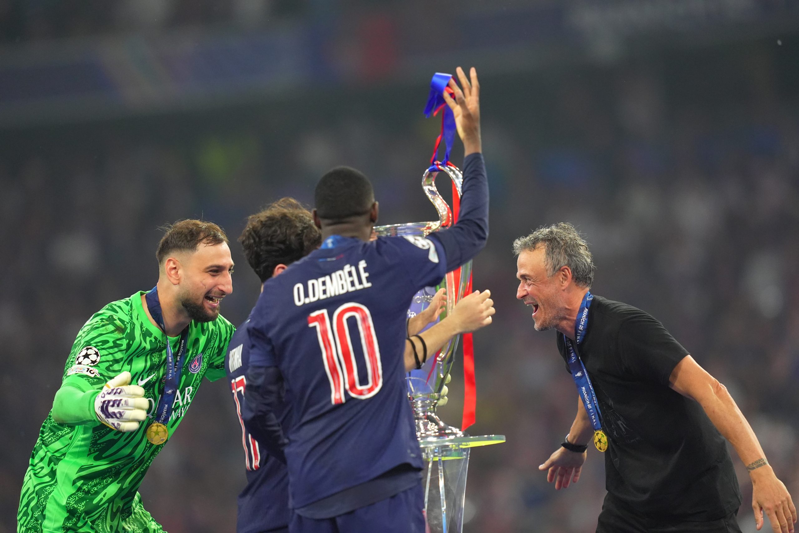 Gianluigi Donnarumma et Luis Enrique, célébrant la victoire en C1 le 31 mai dernier.
