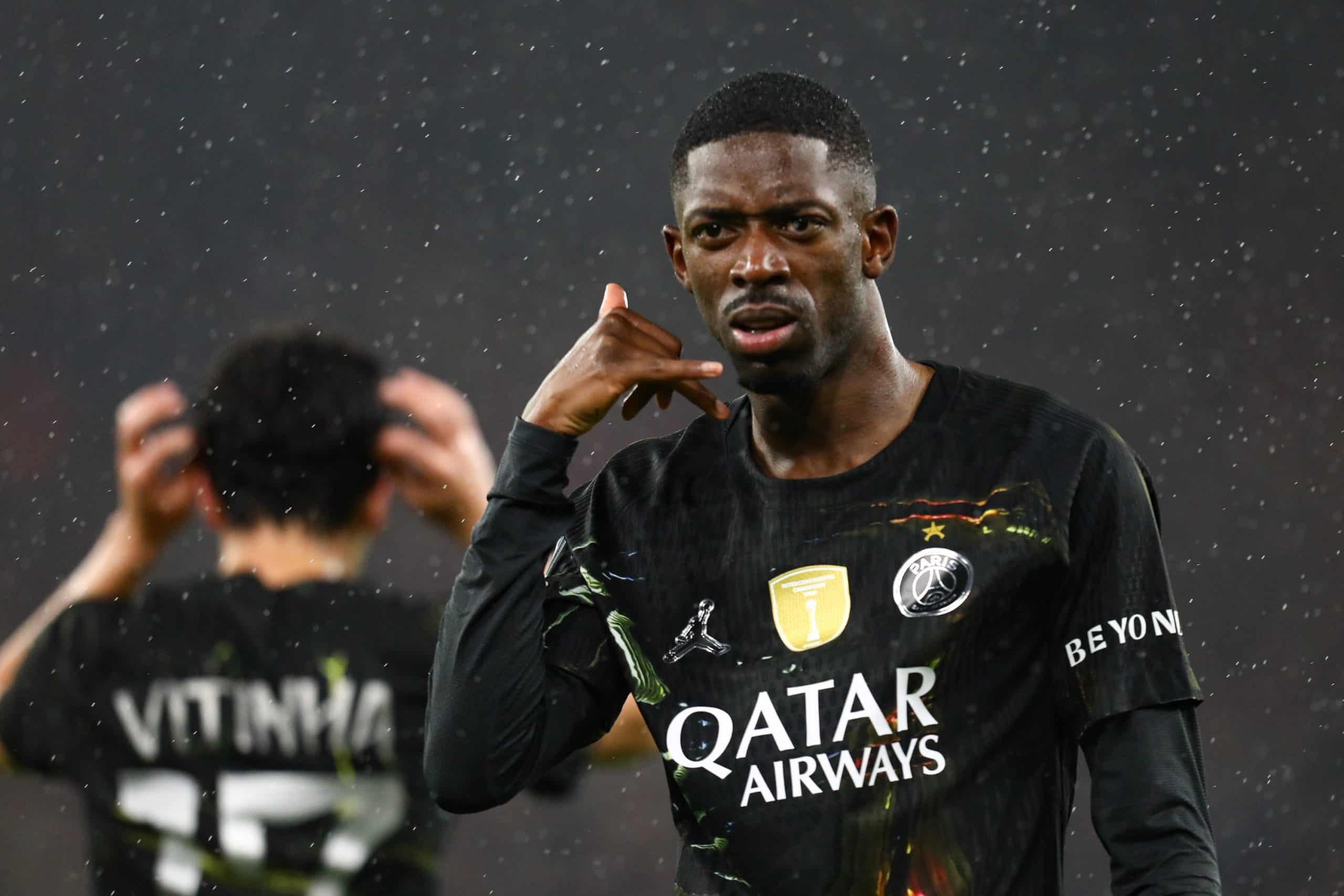 Ousmane Dembélé célébrant l'un de ses buts à Anfield.